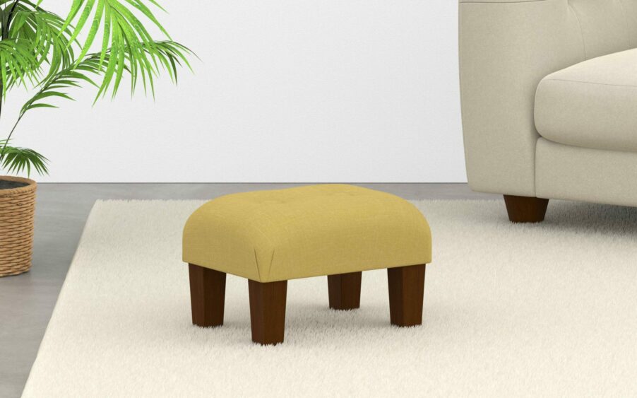 small low mini upholstered button footstool in yellow linen fabric