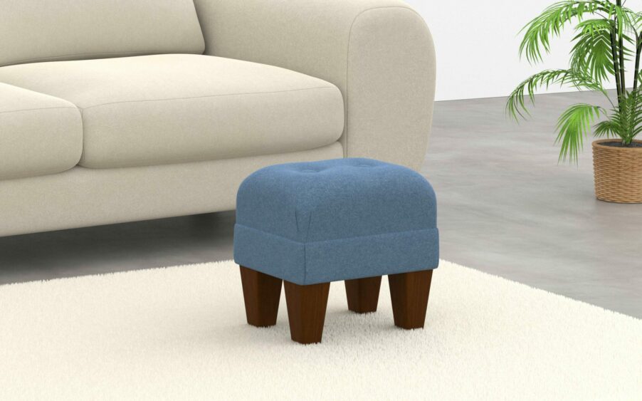 small button footstool in wool light blue fabric
